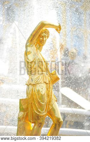 Sculptures Of Peterhof Fountains In The Summer