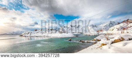 Fabulous Winter Scenery With Lots Of Snow  In Small Fishing Village And Snowy  Mountain Peaks Near V