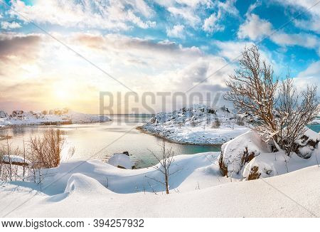 Breathtaking Winter Scenery With Lots Of Snow  In Small Fishing Village And Snowy  Mountain Peaks Ne