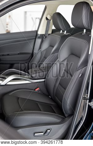 Russia, Izhevsk - August 14, 2020: Geely Showroom. Black Leather Passenger And Driver Seats Inside A