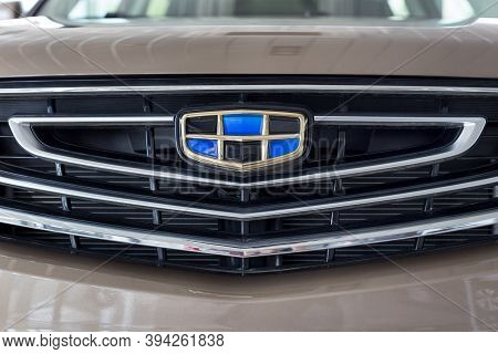 Russia, Izhevsk - August 14, 2020: Geely Showroom. Logo Of Geely On Bumper Of Coolray Car. Car Manuf