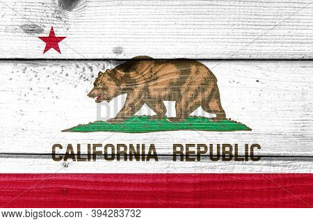 California Flag Painted On Old Wood Plank Background. Brushed Natural Light Knotted Wooden Board Tex