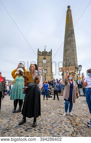 Richmond, North Yorkshire, Uk - June 14, 2020: Female Blm Protester Leading Black Lives Matter Prote