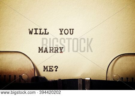Will you marry me? phrase written with a typewriter.