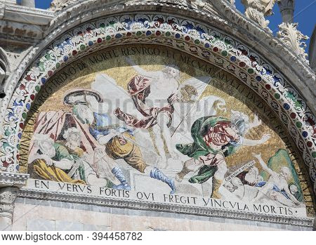 Religious Wide Mosaic With Golden Tiles On The Facade Of The Basilica Of San Marco In Venice In Nort