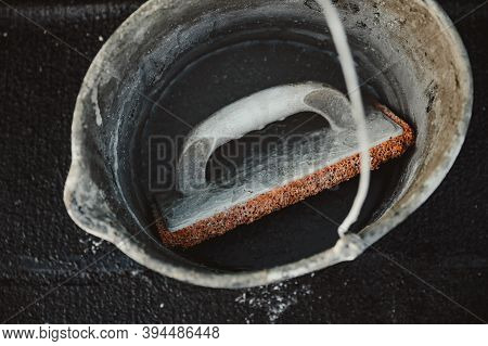 Pponge Trowel In A Bucket On Site