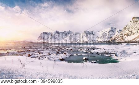 Winter Scenery With Frozen Fjord On Vestvagoy Island With Snowy  Mountain Peaks Near Valberg .  Loca
