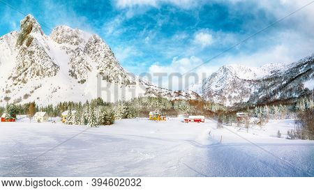 Gorgeous Winter Scenery With Traditional Norwegian Wooden Houses And Pine Trees Near Valberg Village