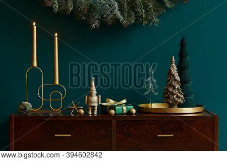 Christmas Composition On Brwon Wooden Commode With Decoration, Christmas Tree, Gifts And Accessories