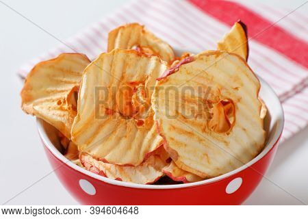 Bowl of dried apple slices - apple chips or rings