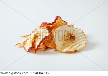 Heap of dried apple slices - apple chips or rings