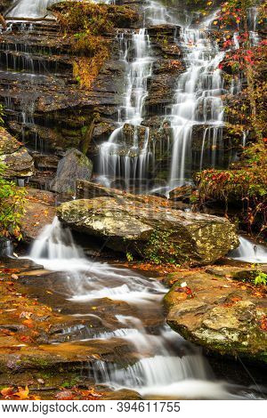 Issaqueena Falls during autumn season in Walhalla, South Carolina, USA.