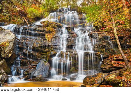 Issaqueena Falls during autumn season in Walhalla, South Carolina, USA.