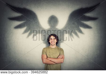 Confident Smiling Man, Long Curly Hair Style, Keeps Arms Folded Imagine Superpowers. Successful And 
