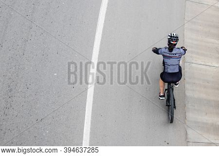 Overhead Shot Of Anamateur Woman Cyclist On The Road Between Bogota And La Calera On The Mountains I
