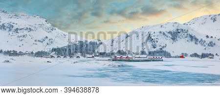 Winter Scene With Traditional Norwegian Red Wooden Houses On The Shore Of Rolvsfjord In Valberg On V