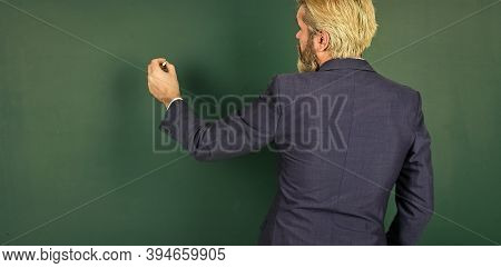First Day At School. Senior Teacher On September 1. University Professor Write On Chalkboard. On Sep