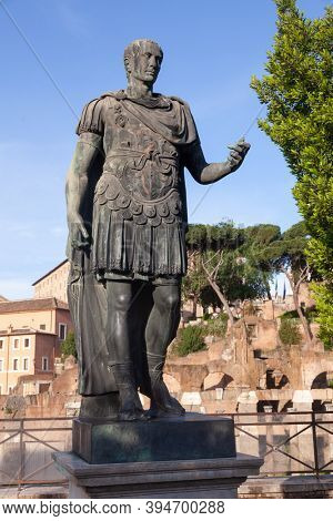 Full length bronze statue of Roman emperor Gaius Julius Caesar at Via dei Fori Imperiali, Rome, Italy