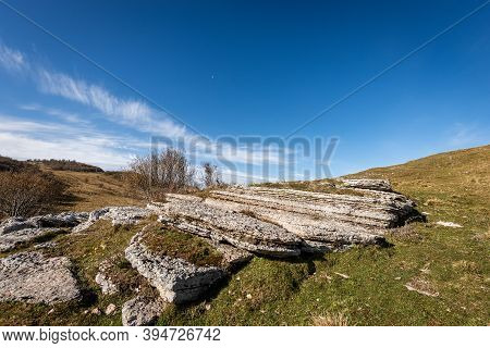 Karst Formations Rocks In Lessinia Plateau (altopiano Della Lessinia), Regional Natural Park In Vero