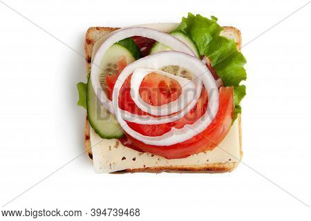 A Slice Of Bread, A Piece Of Cheese, A Lettuce Leaf, Two Pieces Of Smoked Meat, Two Slices Of Cucumb