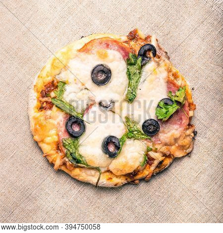 Traditional Italian Appetizer - Mini Pizza, Pizzetta With Sausage, Olives And Mozzarella Cheese On A
