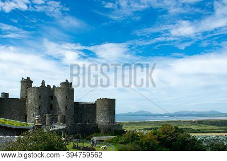 Harlech Castle, Wales. Dramatic, Imposing Fortification. View Of Cardigan Bay. Landscape, Blue Sky B