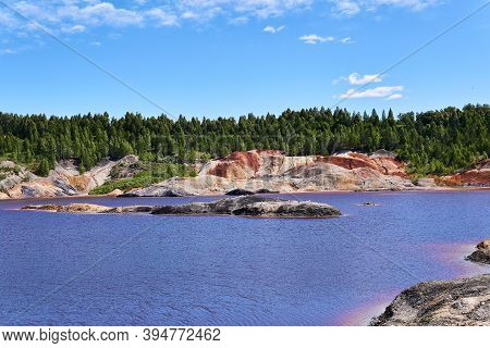 Island Where Gulls Began To Nest In The Middle Of A Lake In An Old Kaolin Quarry