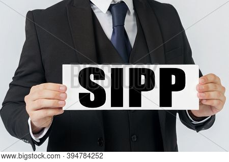 Business And Finance Concept. A Businessman Holds A Sign In His Hands Which Says Sipp - Self Investe