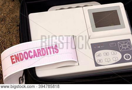 Medicine Concept. A Device For Diagnosing The Work Of The Heart. Cardiogram With Text - Endocarditis