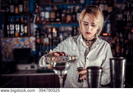 Girl Bartender Concocts A Cocktail On The Beerhall