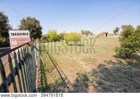 Tarquinia, Italy - 18 September 2020: Area Of The Etruscan Necropolis Of Tarquinia And Road Sign
