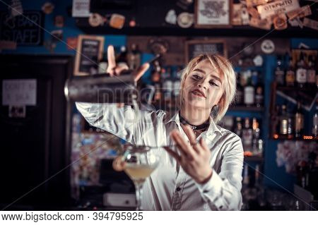 Charming Girl Bartender Demonstrates His Professional Skills At Bar