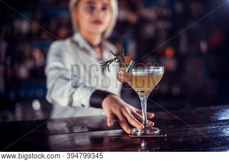 Charming Girl Barman Adds Ingredients To A Cocktail