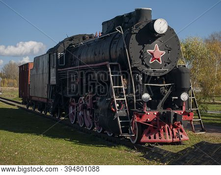 Old Locomotive With Wagons At Skuratovo Railway Station.