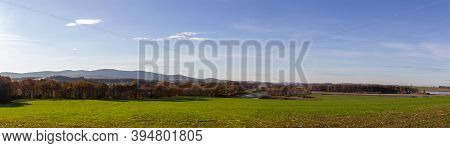 Panoramic View To Czech Autumn Landscape. Dry Pond Dehtar With Meadow, Trees And Distant Hill At Day