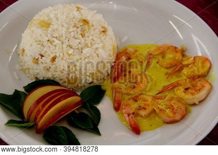 Prado, Bahia / Brazil - October 20, 2012: Grilled Vm Prawns, Topped With Curry Sauce, With Pineapple