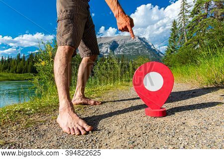 Summer Vacation To The Canadian Rocky Mountains As A Man Is Seen Pointing To Destination Waypoint Ma