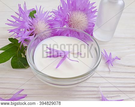 Cream Cosmetic Flower On Wooden Background Product