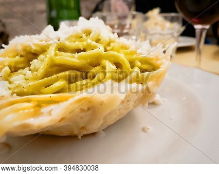 Close Up Of A Portion Of Tonnarelli Pasta With Cheese And Pepper Sauce. Typical Roman Recipe
