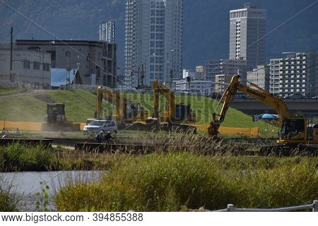 Sapporo Japan October 1 2020 The Construction Site With The Escavators Along With The Toyohira River