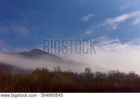Beautiful Landscape With Cloudy Mountain At Twilight
