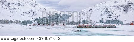 Winter Scene With Traditional Norwegian Red Wooden Houses On The Shore Of Rolvsfjord In Valberg On V