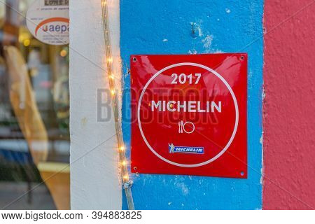 Burano, Italy - January 10, 2017: Famous Restaurant With Michelin Guide Trattoria Al Gatto Nero At B