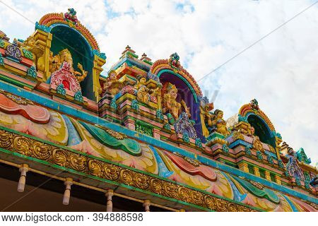 Colorful Statues Of Hindu Gods On Roof Of A Sri Maha Mariamman Temple. Oldest Hindu Temple In Kuala 