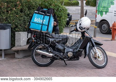 Athens, Greece. Nov 12, 2020. Wolt Courier With Motor Scooter. Food Delivery Service