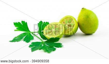 Illustrative Photo Of Limequat, Beautiful Composition With Greens, Banner, On A White Isolated Backg