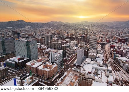 Sapporo, Hokkaido, Japan downtown skyline from above at sunset.