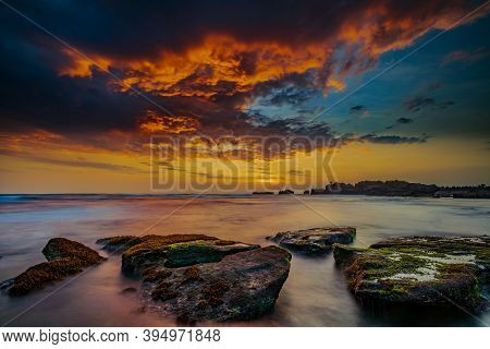 Calm Ocean Long Exposure. Stones In Mysterious Mist Of The Sea Waves. Concept Of Nature Background. 