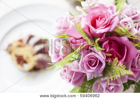 Pink Rose Flower On Front Of Beef Medallions