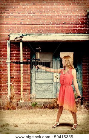 Woman With Assault Rifle And Handgun